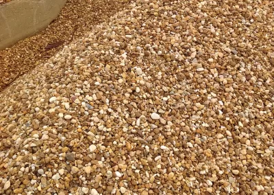 heap of half inch brown smooth river rock for purchase in bulk